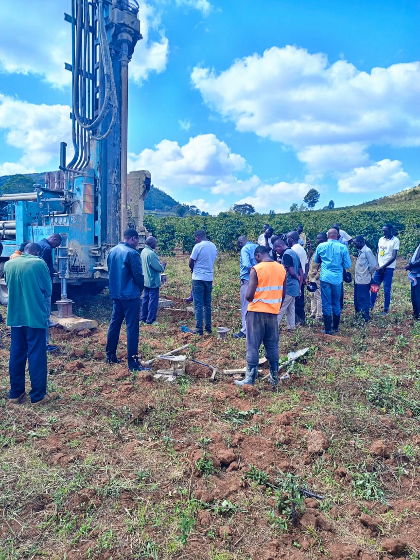 Team working on water tank installation